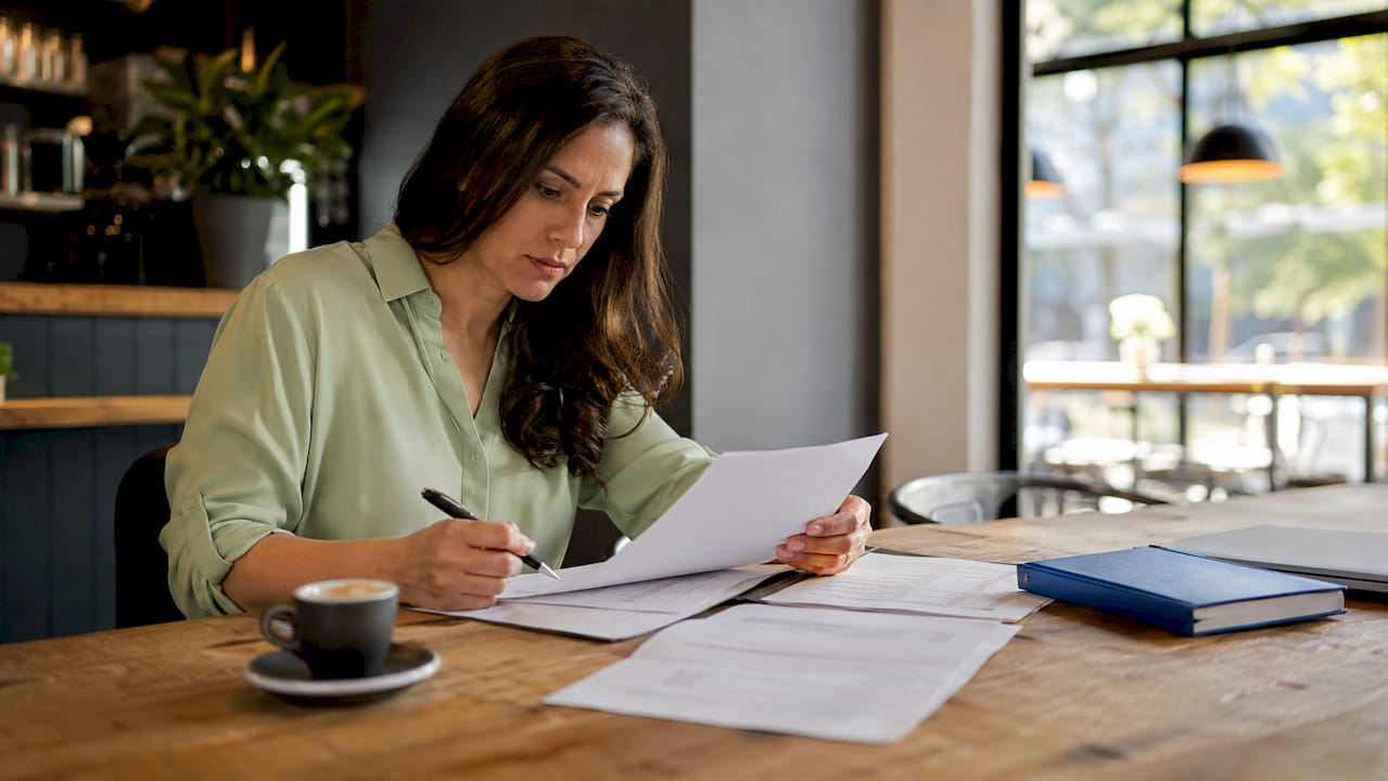 1782984073543_Client-reviewing-hard-money-loan-documents Client reviewing hard money loan documents