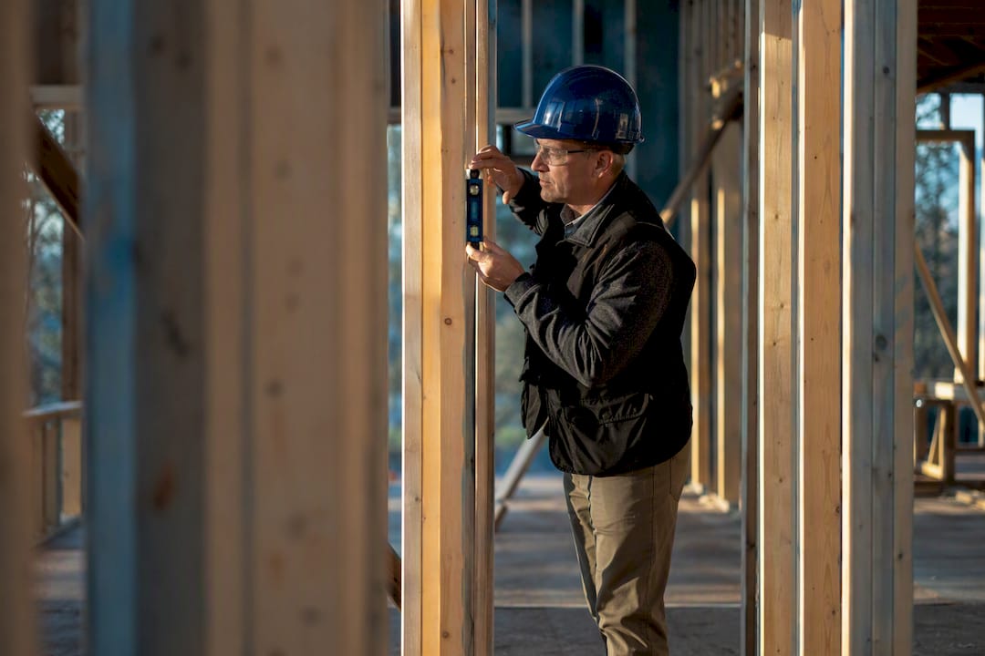 1788595924350_Inspector-checking-a-residential-construction-project Inspector checking a residential construction project